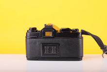 Load image into Gallery viewer, Chinon CE-4 35mm SLR Film Camera with Chinon 50mm f/1.9 Lens
