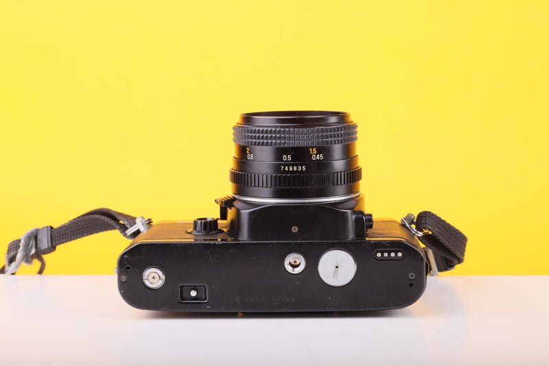 Chinon CE-4 35mm SLR Film Camera with Chinon 50mm f/1.9 Lens