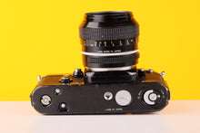 Load image into Gallery viewer, Nikon F2 35mm Film Camera with Nikon 50mm f1.4 Prime Lens
