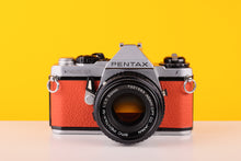 Load image into Gallery viewer, Pentax ME Super Vintage 35mm Film Camera with SMC Pentax-M 50mm f/1.7 Lens in Orange
