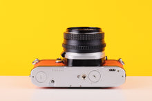 Load image into Gallery viewer, Pentax ME Super Vintage 35mm Film Camera with SMC Pentax-M 50mm f/1.7 Lens in Orange
