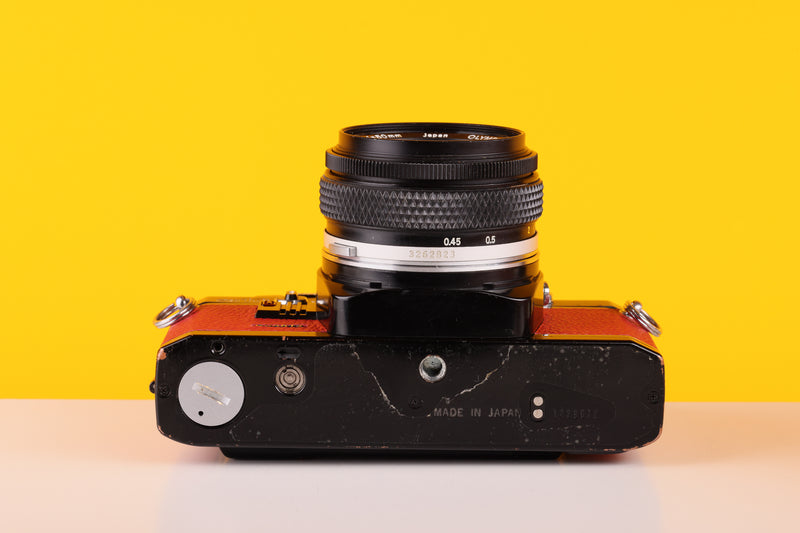 Olympus OM10 Black Quarz 35mm SLR Film Camera with Zuiko 50mm f/1.8 Lens