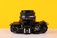 Load image into Gallery viewer, Minolta X-700 35mm Film SLR Camera with Minolta MD Rokkor 45mm f/2 Lens
