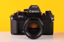 Load image into Gallery viewer, Canon F-1 35mm SLR Film Camera with Canon FD 50mm f1.4 Lens
