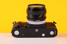 Load image into Gallery viewer, Canon F-1 35mm SLR Film Camera with Canon FD 50mm f1.4 Lens
