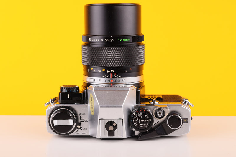 Olympus OM10 35mm SLR Film Camera with Manual Adapter and Olympus OM-System E.Zuiko Auto-T 135mm f3.5 Lens