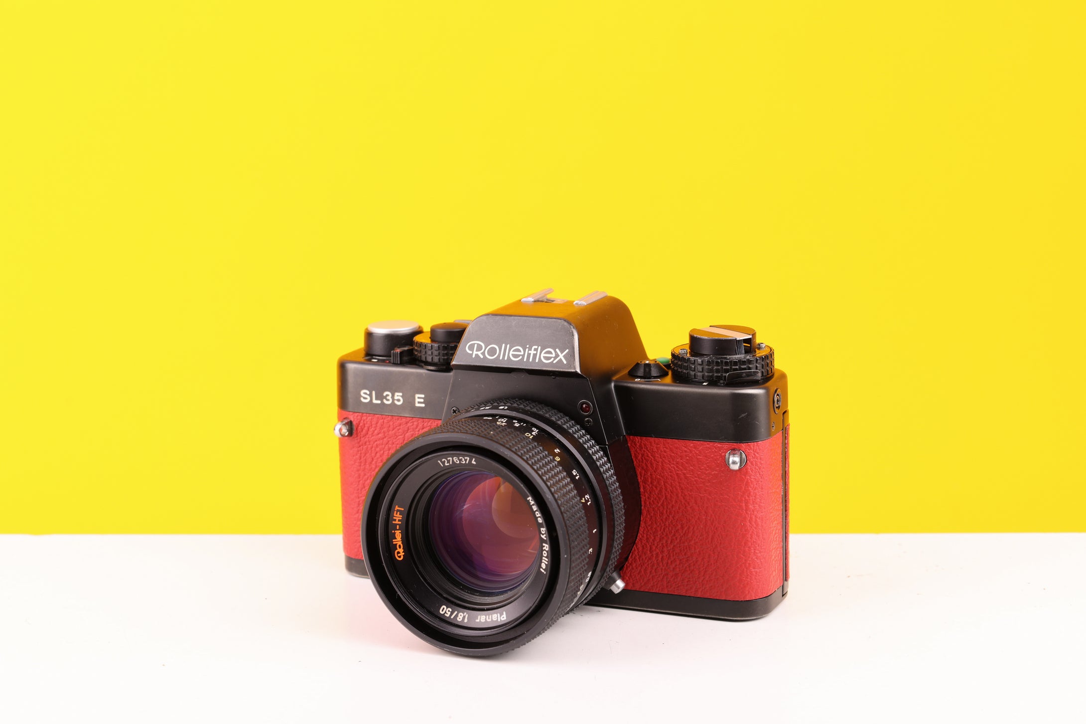 Rolleiflex SL35 E 35mm Film Camera with Rollei Planar 50mm f1.8 Lens in Red