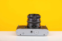 Load image into Gallery viewer, Rolleiflex SL35 35mm Film Camera with Rollei Planar 50mm f1.8 Lens
