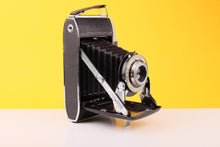Load image into Gallery viewer, Kodak Junior II London Folding Camera with 105mm f/6.3 Anaston Lens
