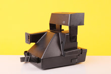 Load image into Gallery viewer, Polaroid Sun 660 Autofocus Instant Camera – 600 Film

