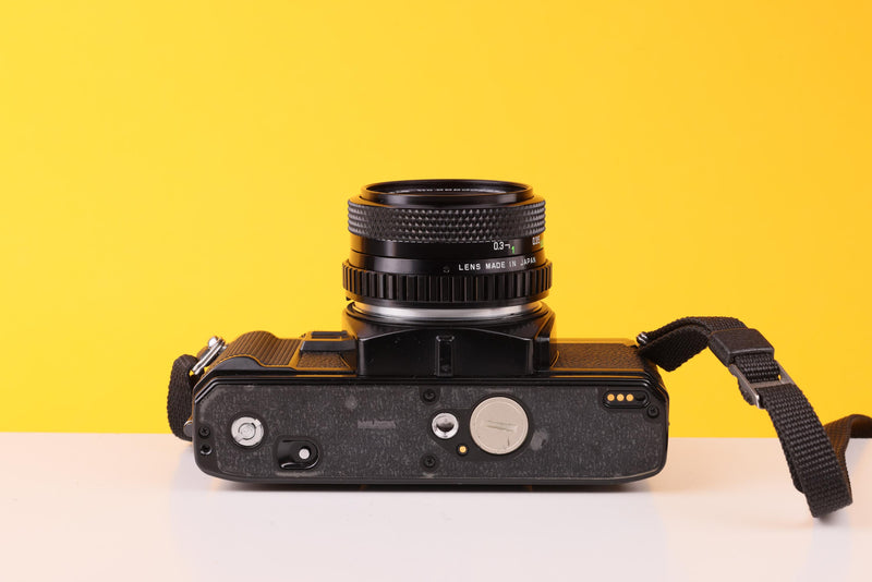 Minolta X-300 35mm SLR Film Camera with Soligor 28mm f/2.8 Lens
