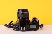 Load image into Gallery viewer, Canon EOS 1000F N 35mm SLR 35mm Film Camera + Canon EF 35-80mm f/4-5.6 Lens
