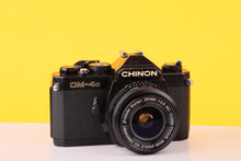Load image into Gallery viewer, Chinon CM-4S 35mm SLR Film Camera + Vivitar 28mm f/2.8 Lens

