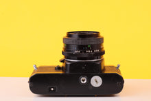 Load image into Gallery viewer, Chinon CM-4S 35mm SLR Film Camera + Vivitar 28mm f/2.8 Lens
