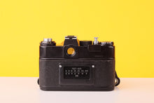 Load image into Gallery viewer, Zenit 11 35mm SLR Film Camera with Helios-44M-4 58mm f/2 Lens
