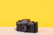 Load image into Gallery viewer, Pentax Auto 110 SLR Film Camera + 24mm f/2.8 Lens
