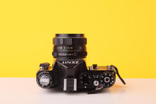 Load image into Gallery viewer, Zenit 11 35mm SLR Film Camera with Helios-44M-4 58mm f/2 Lens
