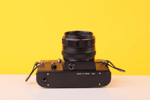 Load image into Gallery viewer, Zenit 11 35mm SLR Film Camera with Helios-44M-4 58mm f/2 Lens
