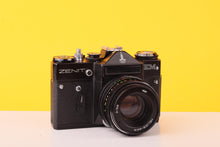 Load image into Gallery viewer, Zenit EM 35mm SLR Film Camera with Helios-44M 58mm f/2 Lens M42 mount
