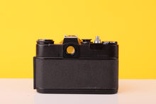 Load image into Gallery viewer, Zenit EM 35mm SLR Film Camera with Helios-44M 58mm f/2 Lens M42 mount
