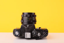 Load image into Gallery viewer, Zenit EM 35mm SLR Film Camera with Helios-44M 58mm f/2 Lens M42 mount
