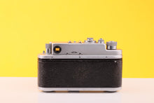 Load image into Gallery viewer, Zorki 4 Rangefinder 35mm Film Camera with Jupiter-8 50mm f/2 Lens
