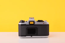 Load image into Gallery viewer, Pentax ME F 35mm SLR Film Camera + SMC Pentax-M 50mm f/1.7 Lens
