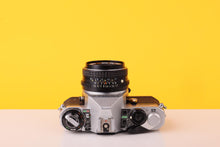 Load image into Gallery viewer, Pentax ME F 35mm SLR Film Camera + SMC Pentax-M 50mm f/1.7 Lens
