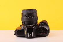 Load image into Gallery viewer, Canon EOS 850 35mm Autofocus SLR Film Camera with Sigma 35–80mm Zoom Lens
