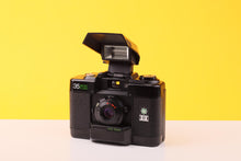 Load image into Gallery viewer, Hanimex 35 Micro Flash 35mm Point And Shoot Film Camera – 32mm f/2.8
