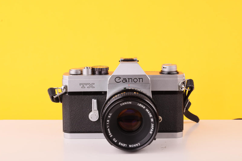 Canon TX 35mm SLR Film Camera + Canon FD 50mm f/1.8 S.C. Lens