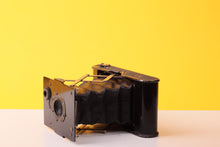 Load image into Gallery viewer, Vest Pocket Autographic Kodak 127 Camera with Case - World war I - The Soldier’s Kodak
