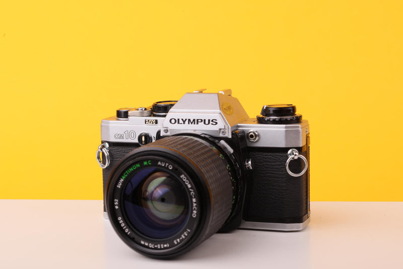 Olympus OM10 35mm Film SLR Camera + SunAction MC Auto Zoom 35–70mm f/3.5–4.5 Macro Lens