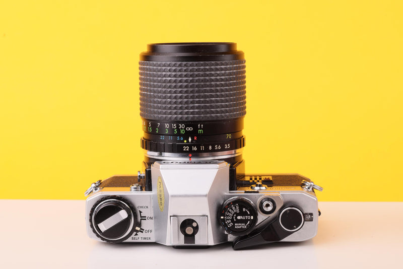 Olympus OM10 35mm Film SLR Camera + SunAction MC Auto Zoom 35–70mm f/3.5–4.5 Macro Lens