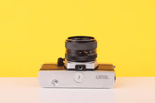 Load image into Gallery viewer, Praktica Super TL1000 35mm SLR Film Camera with Yashinon DS-M Auto 50mm f/1.7 Lens
