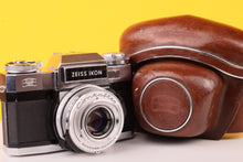 Load image into Gallery viewer, Zeiss Ikon Contaflex - Carl Zeiss Tessar 50mm f/2.8 35mm SLR Film Camera with case

