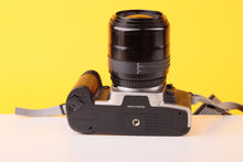 Load image into Gallery viewer, Nikon F65 35mm SLR Film Camera with Sigma 28–70mm f/3.5–4.5 Zoom Lens
