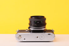 Load image into Gallery viewer, Pentax ME 35mm SLR Film Camera with Miranda 50mm f/2 Lens
