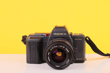 Load image into Gallery viewer, Yashica 230-AF 35mm Autofocus SLR Film Camera with Yashica 35-70mm Lens
