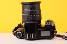 Load image into Gallery viewer, Canon EOS 1000F N 35mm Film SLR Camera with Sigma 28-105mm Zoom Lens
