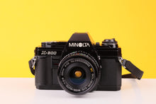 Load image into Gallery viewer, Minolta X-300 35mm SLR Film Camera with Soligor 28mm f/2.8 Lens

