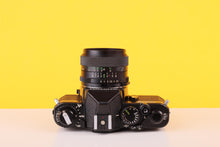 Load image into Gallery viewer, Chinon CE-3 Memotron 35mm SLR Film Camera with Chinon 28mm f/2.8 Len
