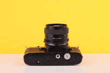 Load image into Gallery viewer, Chinon CE-3 Memotron 35mm SLR Film Camera with Chinon 28mm f/2.8 Len
