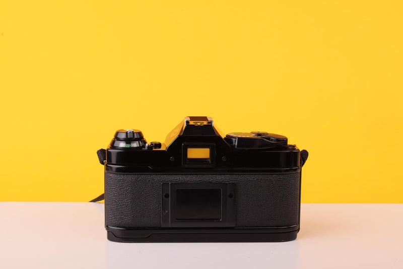 Canon AE-1 Program Black 35mm Film Camera with Canon FD 50mm f/1.8 Lens