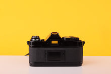 Load image into Gallery viewer, Canon AE-1 Program Black 35mm Film Camera with Canon FD 50mm f/1.8 Lens
