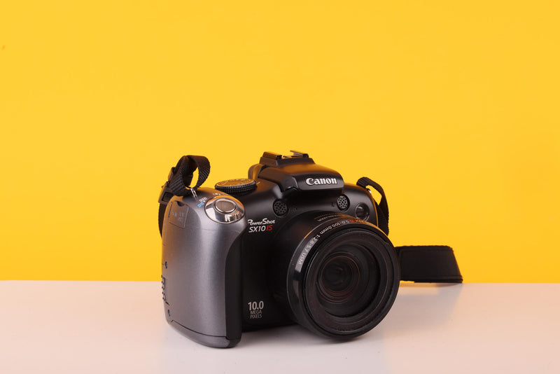 Canon PowerShot SX10 IS 10MP Digital Bridge Camera 20x Optical Zoom