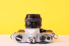 Load image into Gallery viewer, Fujica ST605 35mm SLR Film Camera with Fujinon 55mm f/2.2 Lens
