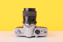 Load image into Gallery viewer, Minolta SR-1 35mm SLR Film Camera with Vivitar 28-70mm Macro Zoom Lens
