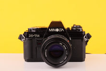 Load image into Gallery viewer, Minolta X-7A 35mm SLR Film Camera with MD 50mm f/1.7 Lens
