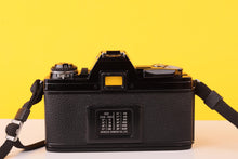 Load image into Gallery viewer, Minolta X-7A 35mm SLR Film Camera with MD 50mm f/1.7 Lens
